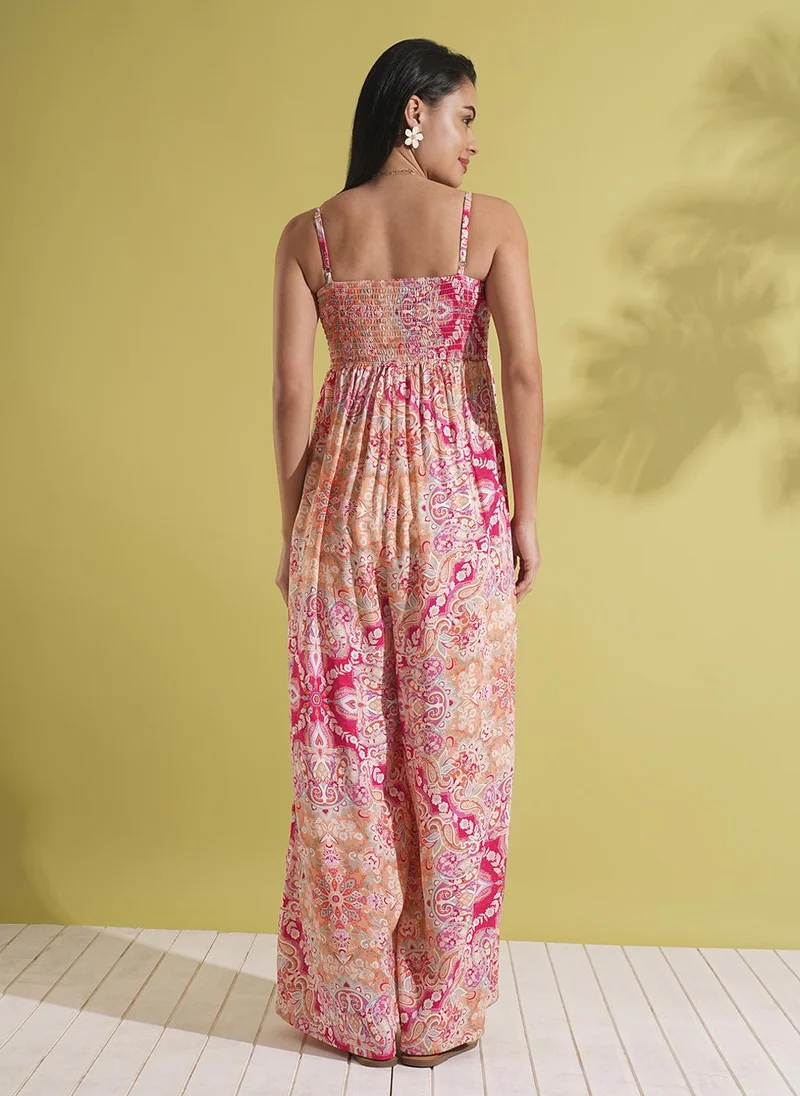 globus Pink Globus Women Square Neck Adjustable Strappy Shoulder Smocked Floral Print Wide Leg Jumpsuit for Women | Best Price UAE